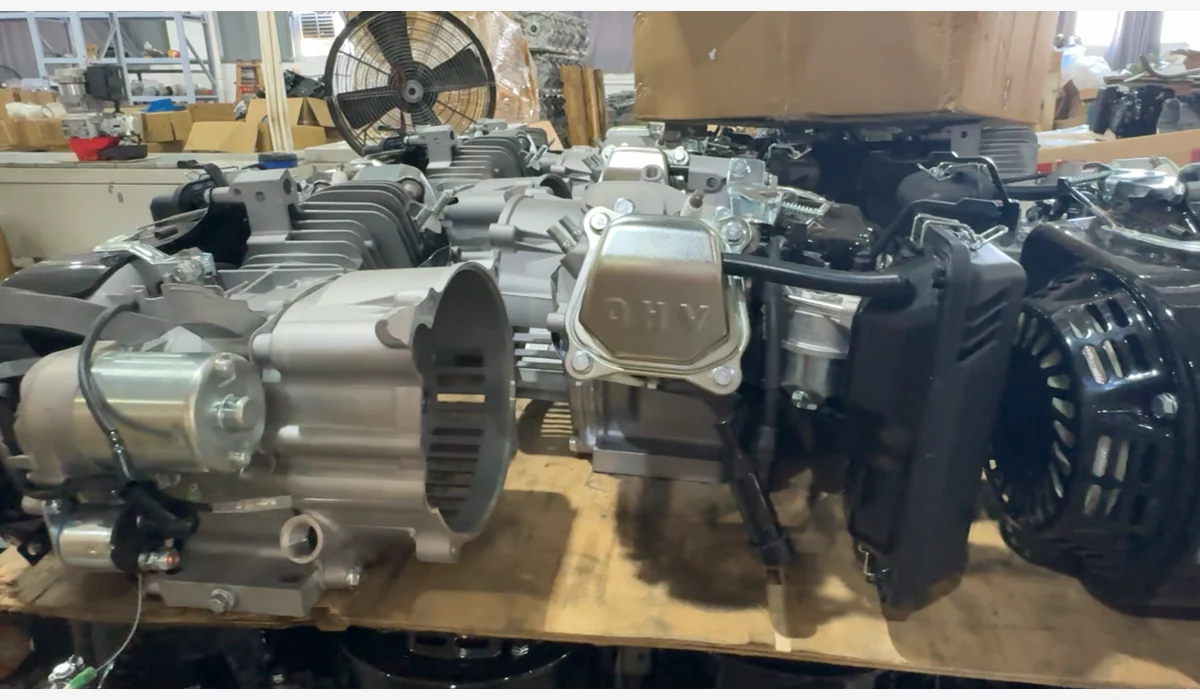 Several engine and alternator assemblies arranged on a workshop bench