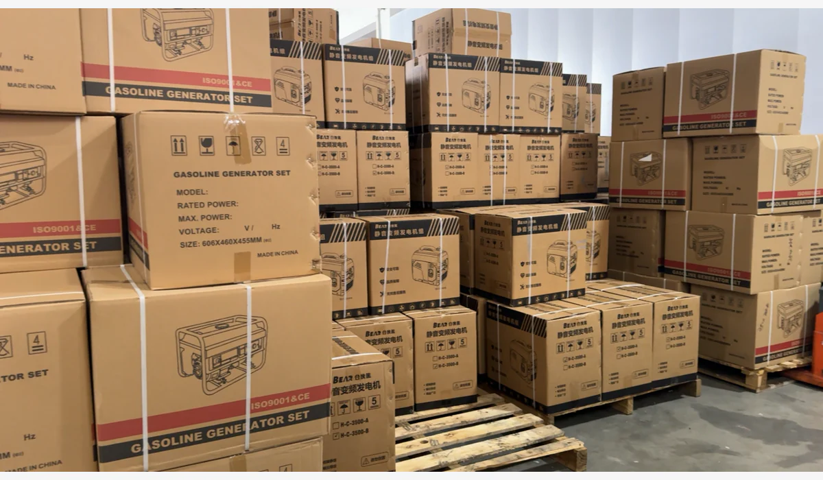 Generator cartons of several sizes stacked on pallets in a storage area