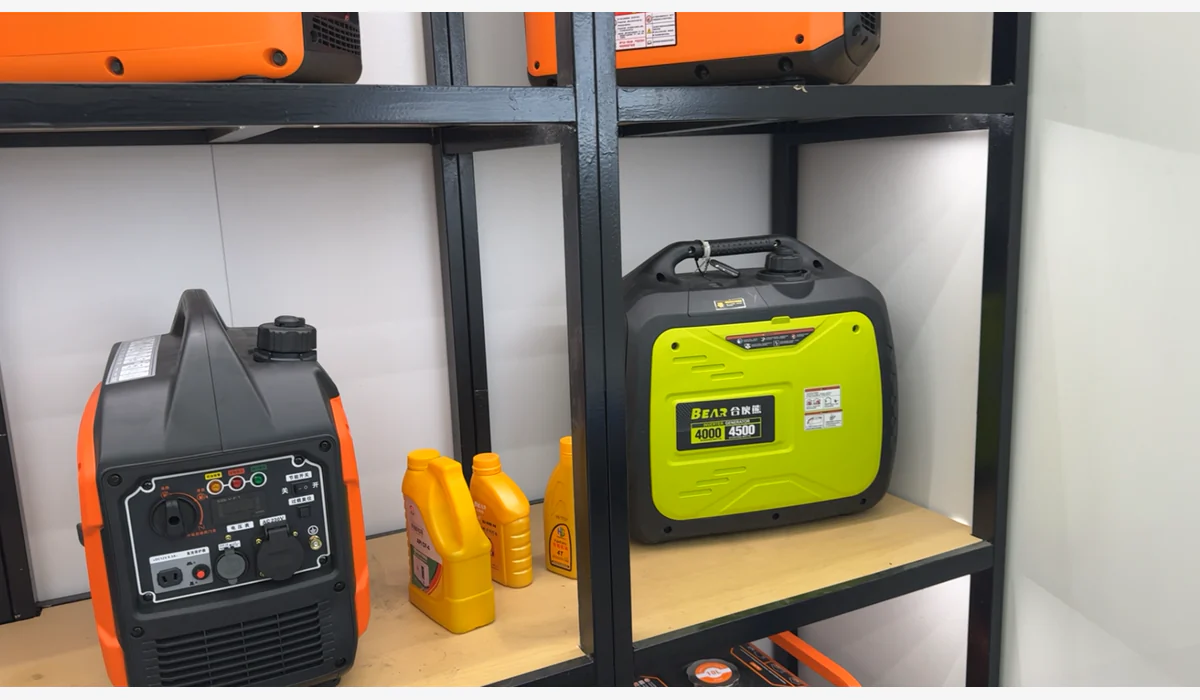 Portable generators displayed on shelves beside several containers of engine oil