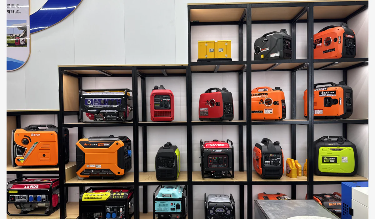 Open-frame and enclosed portable generators in different shapes and sizes displayed on showroom shelves