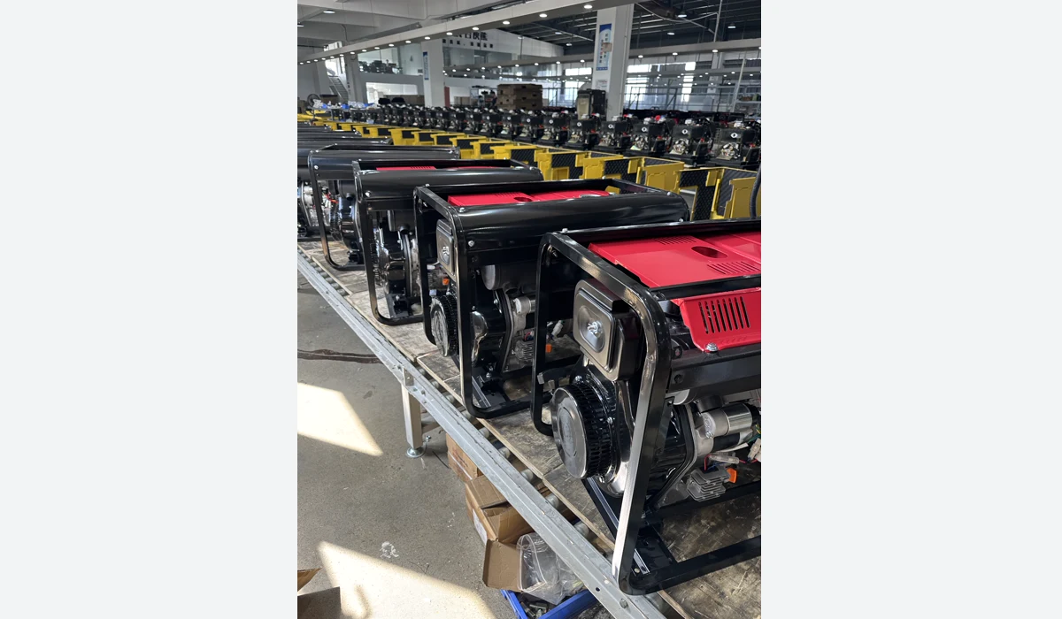 Open-frame generators on a factory table, visual context only